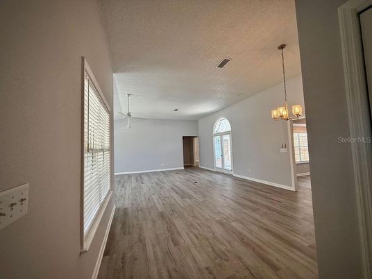 Chandelier, Empty room, Interior, Recessed Lighting, Wood Texture Flooring