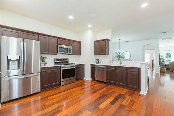 Interior, Kitchen, Recessed Lighting, Stainless Steel Appliances, Wood Texture Flooring