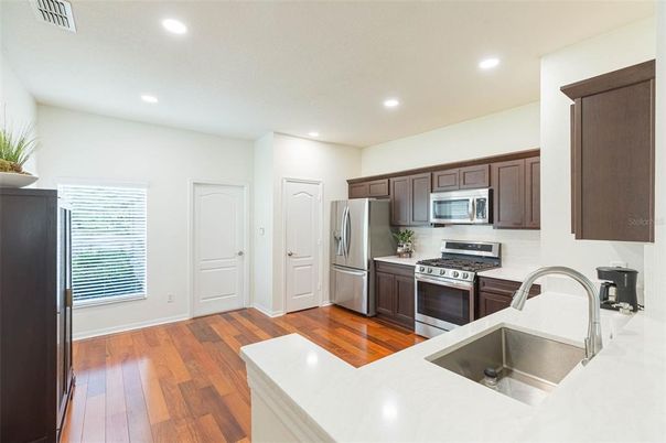 Interior, Kitchen, Recessed Lighting, Stainless Steel Appliances, Wood Texture Flooring