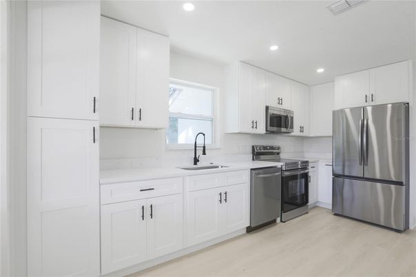 Interior, Kitchen, Recessed Lighting, Stainless Steel Appliances, Wood Texture Flooring