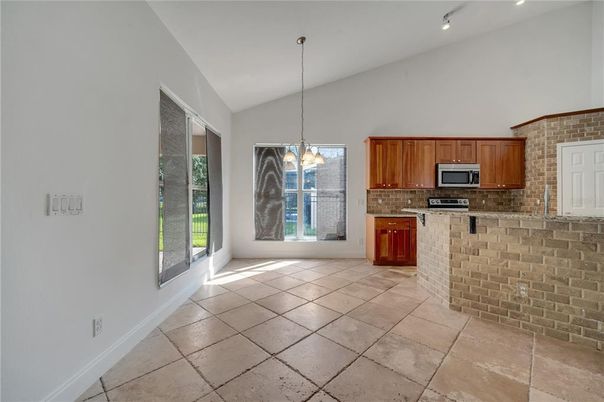 Interior, Kitchen, Pendant Lights, Stainless Steel Appliances, Stone Walls