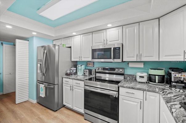 Interior, Kitchen, Recessed Lighting, Stainless Steel Appliances, Wood Texture Flooring