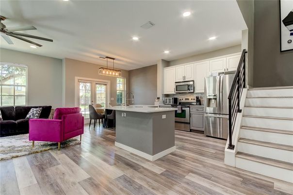 Dining room, Interior, Kitchen, Living room, Pendant Lights, Recessed Lighting, Stainless Steel Appliances, Wood Texture Flooring