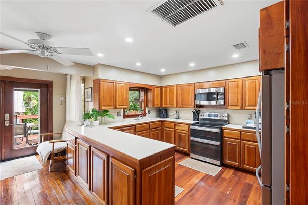 Interior, Kitchen, Recessed Lighting, Stainless Steel Appliances, Wood Texture Flooring