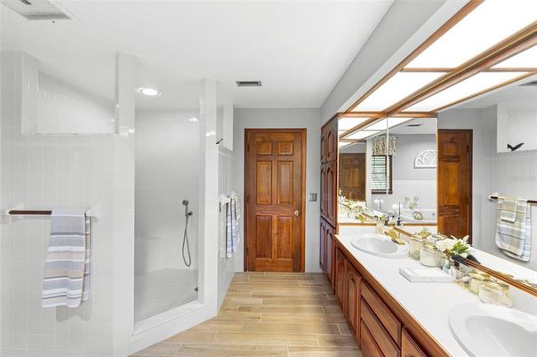 Bathroom, Dual Sink Vanities, Interior, Recessed Lighting, Wood Texture Flooring