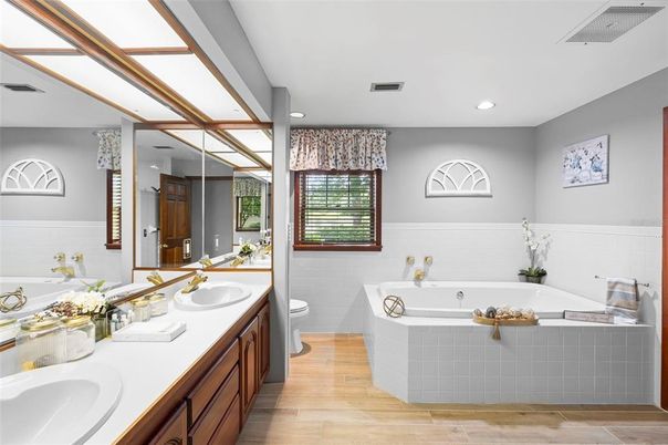 Bathroom, Dual Sink Vanities, Interior, Recessed Lighting, Wood Texture Flooring