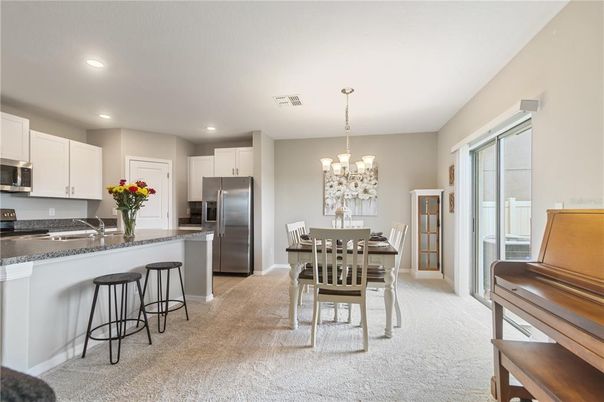 Chandelier, Dining room, Interior, Kitchen, Recessed Lighting, Stainless Steel Appliances