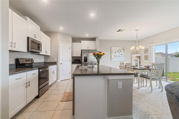 Chandelier, Dining room, Interior, Kitchen, Recessed Lighting, Stainless Steel Appliances