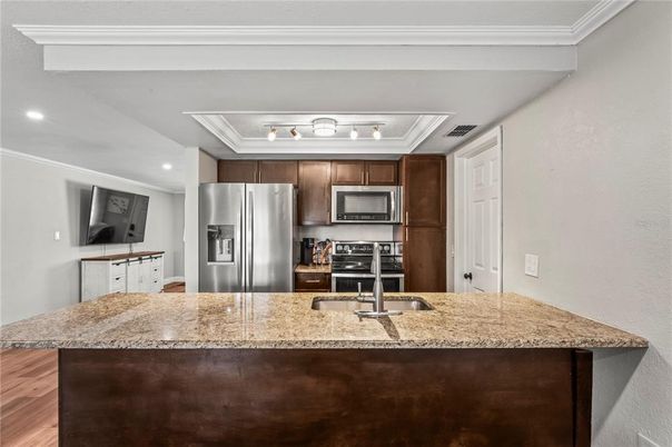 Interior, Kitchen, Recessed Lighting, Stainless Steel Appliances, Wood Texture Flooring