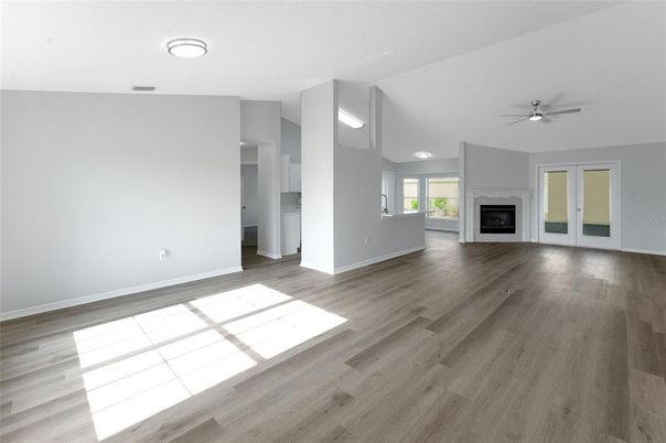Empty room, Fireplace, Interior, Recessed Lighting, Wood Texture Flooring