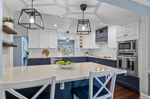 Interior, Kitchen, Pendant Lights, Recessed Lighting, Stainless Steel Appliances, Wood Texture Flooring