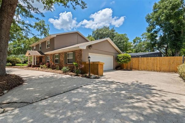 Attached, Exterior, Facade, Brick Facade, American Craftsman
