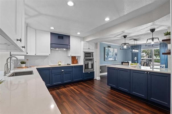 Dining room, Interior, Kitchen, Pendant Lights, Recessed Lighting, Stainless Steel Appliances, Wood Texture Flooring
