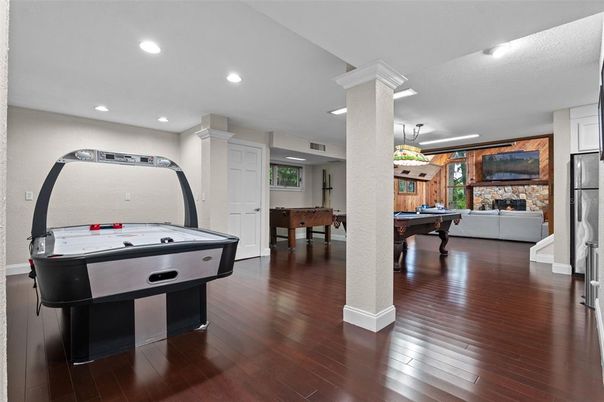 Billiard Table, Fireplace, Game Room, Interior, Recessed Lighting, Wood Texture Flooring