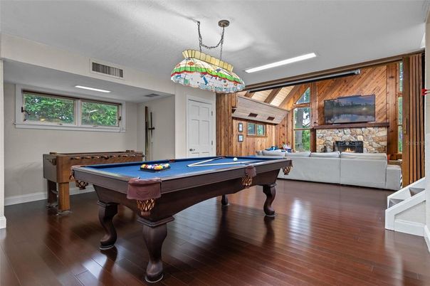 Billiard Table, Fireplace, Game Room, Interior, Pendant Lights, Wood Texture Flooring, Wooden Walls