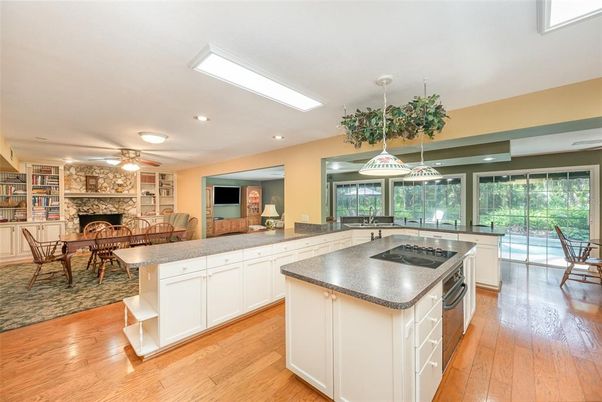 Dining room, Fireplace, Interior, Kitchen, Living room, Pendant Lights, Recessed Lighting, Wood Texture Flooring