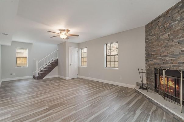 Empty room, Fireplace, Interior, Stone Walls, Wood Texture Flooring