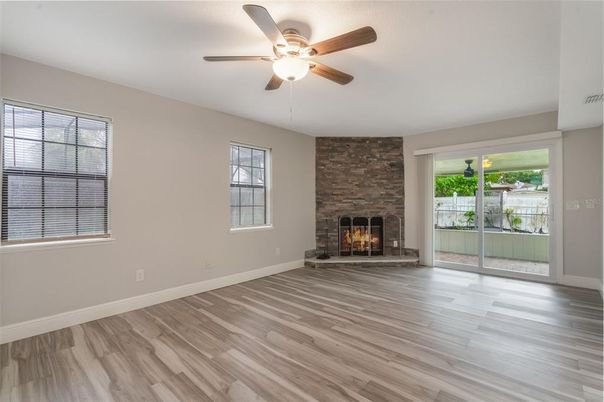 Empty room, Fireplace, Interior, Stone Walls, Wood Texture Flooring