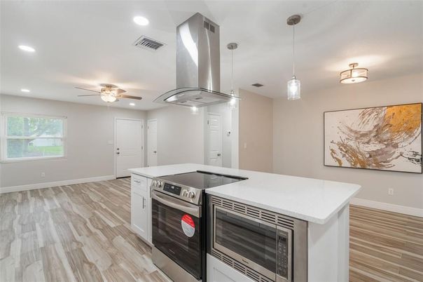 Interior, Kitchen, Pendant Lights, Recessed Lighting, Stainless Steel Appliances, Wood Texture Flooring