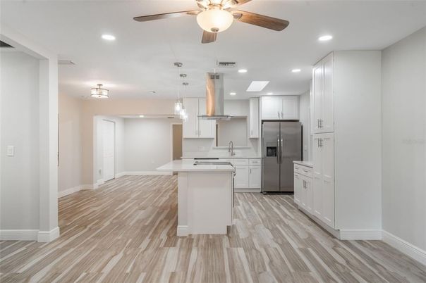 Interior, Kitchen, Pendant Lights, Recessed Lighting, Stainless Steel Appliances, Wood Texture Flooring