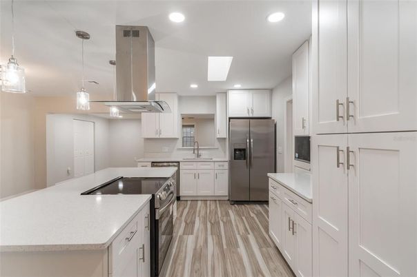 Interior, Kitchen, Pendant Lights, Recessed Lighting, Stainless Steel Appliances, Wood Texture Flooring