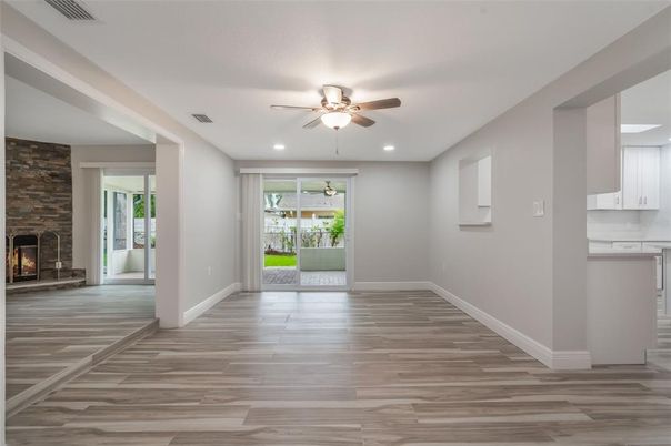 Fireplace, Interior, Recessed Lighting, Stone Walls, Wood Texture Flooring