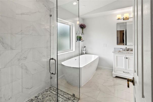 Bathroom, Free Standing Baths, Glass Shower, Interior, Marble, Marble Walls, Recessed Lighting