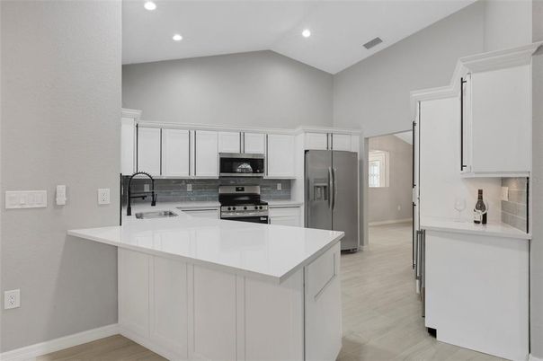 Interior, Kitchen, Recessed Lighting, Stainless Steel Appliances, Wood Texture Flooring
