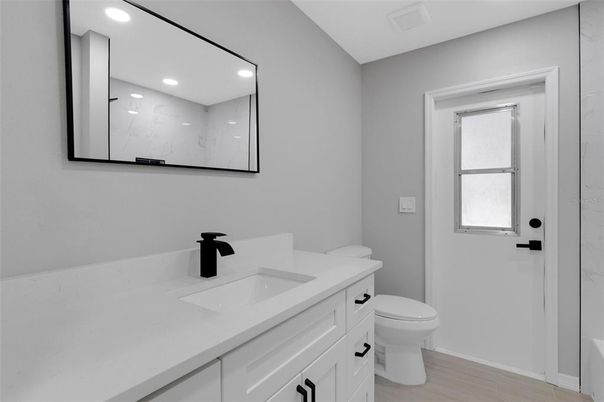 Bathroom, Interior, Marble Walls, Recessed Lighting, Wood Texture Flooring