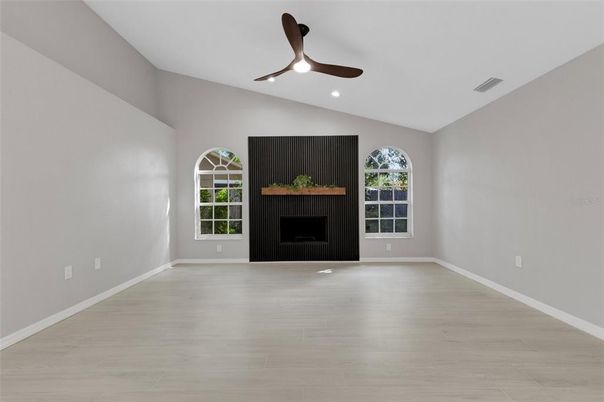 Empty room, Fireplace, Interior, Recessed Lighting, Wood Texture Flooring