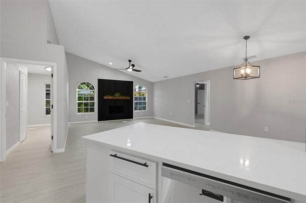 Fireplace, Interior, Kitchen, Pendant Lights, Recessed Lighting, Wood Texture Flooring