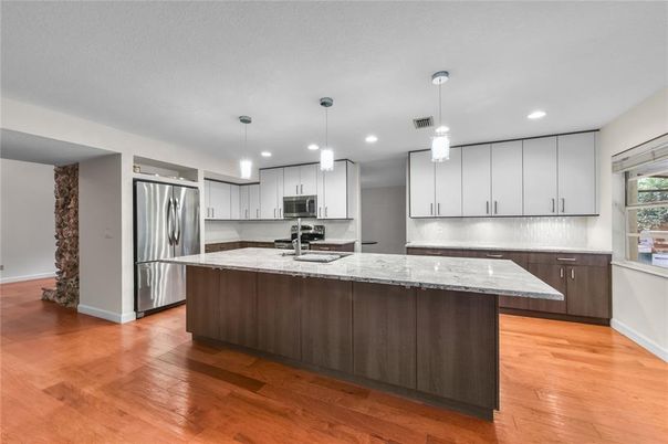 Interior, Kitchen, Pendant Lights, Recessed Lighting, Stainless Steel Appliances, Wood Texture Flooring
