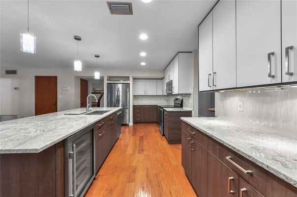 Interior, Kitchen, Pendant Lights, Recessed Lighting, Stainless Steel Appliances, Wood Texture Flooring