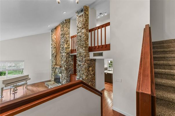 Fireplace, Interior, Piano, Recessed Lighting, Wood Texture Flooring
