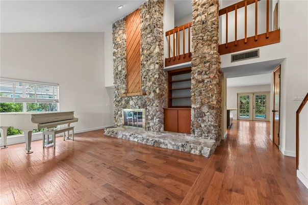 Fireplace, Interior, Piano, Recessed Lighting, Wood Texture Flooring