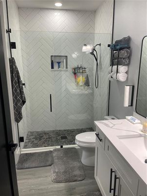 Bathroom, Glass Shower, Interior, Recessed Lighting, Wood Texture Flooring