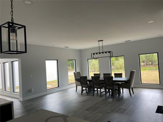 Dining room, Interior, Pendant Lights, Recessed Lighting, Wood Texture Flooring