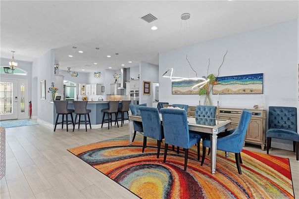 Dining room, Interior, Kitchen, Pendant Lights, Recessed Lighting, Stainless Steel Appliances, Wood Texture Flooring