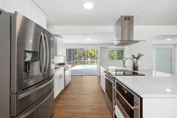 Interior, Kitchen, Recessed Lighting, Stainless Steel Appliances, Wood Texture Flooring