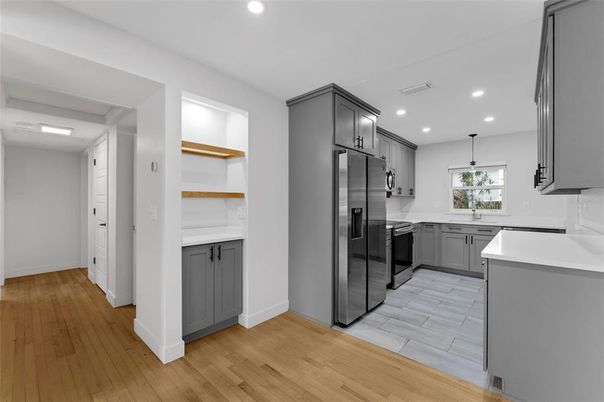 Interior, Kitchen, Pendant Lights, Recessed Lighting, Stainless Steel Appliances, Wood Texture Flooring