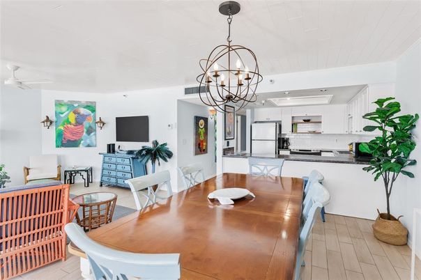 Chandelier, Dining room, Interior, Kitchen, Stainless Steel Appliances, Wood Texture Flooring