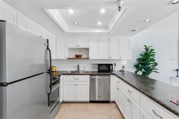 Interior, Kitchen, Recessed Lighting, Stainless Steel Appliances, Wood Texture Flooring