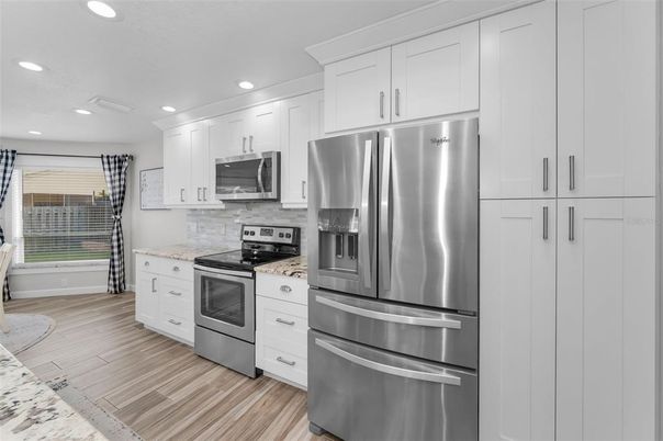 Interior, Kitchen, Recessed Lighting, Stainless Steel Appliances, Wood Texture Flooring