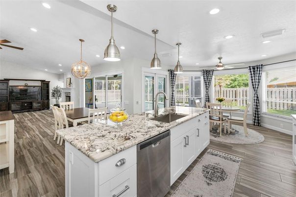 Dining room, Interior, Kitchen, Pendant Lights, Recessed Lighting, Stainless Steel Appliances, Wood Texture Flooring