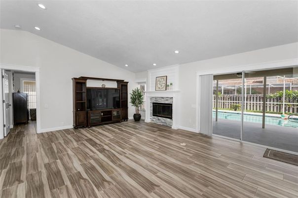 Empty room, Fireplace, Interior, Recessed Lighting, Wood Texture Flooring
