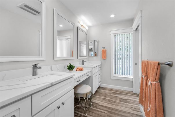 Bathroom, Dual Sink Vanities, Interior, Recessed Lighting, Wood Texture Flooring
