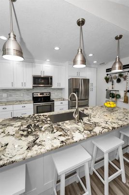 Interior, Kitchen, Pendant Lights, Recessed Lighting, Stainless Steel Appliances, Wood Texture Flooring