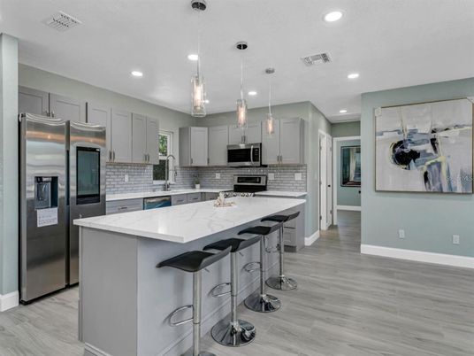 Interior, Kitchen, Pendant Lights, Recessed Lighting, Stainless Steel Appliances, Wood Texture Flooring