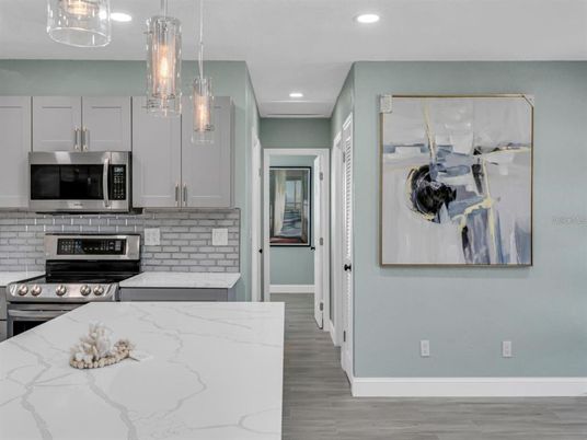 Interior, Kitchen, Pendant Lights, Recessed Lighting, Stainless Steel Appliances, Wood Texture Flooring