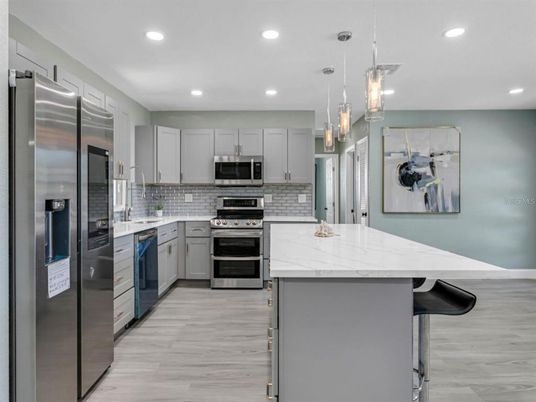 Interior, Kitchen, Pendant Lights, Recessed Lighting, Stainless Steel Appliances, Wood Texture Flooring